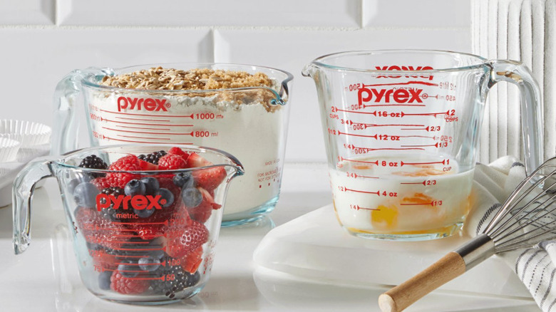 Pyrex measuring cups in different sizes