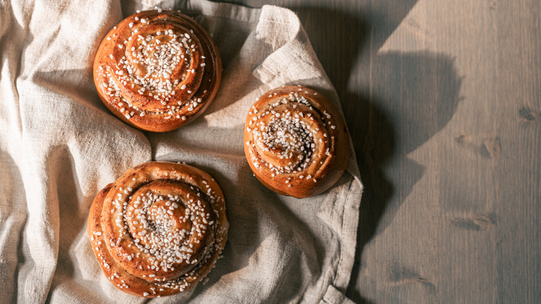 Cinnamon buns of linen kitchen towel