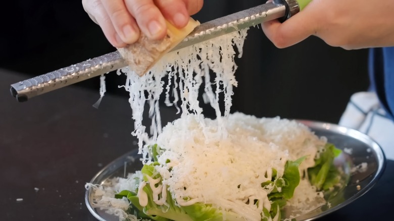 Shredding cheese with Microplane grater
