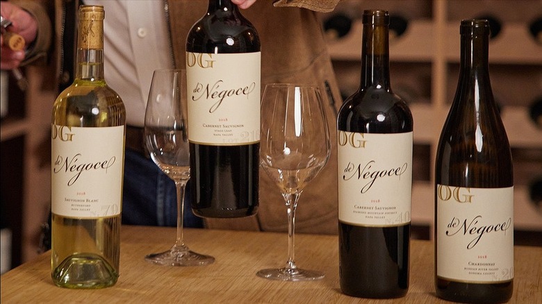 Bottles of deNegoce wine