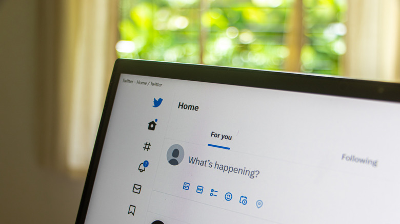 A peek at Twitter on a laptop