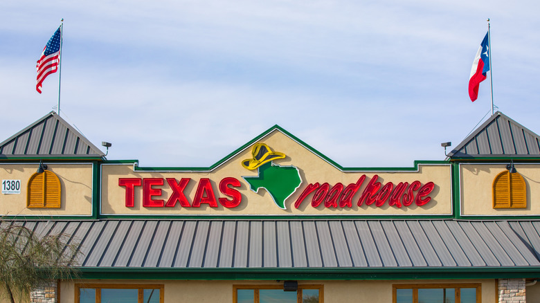 Texas Roadhouse roof signage in daytime