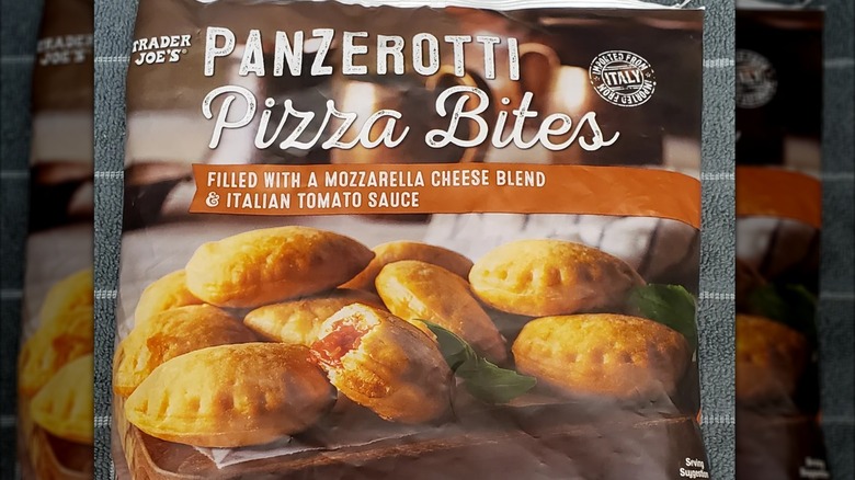 A bag of Trader Joe's Panzerotti Pizza Bites sit on a kitchen towel
