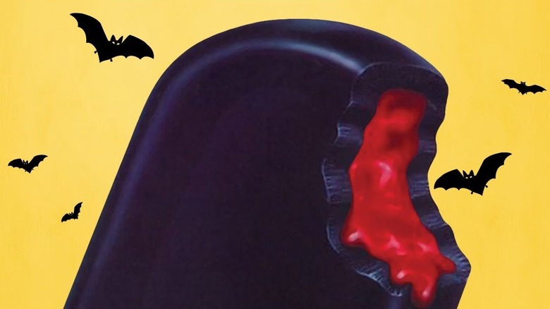 Vampire's Secret ice pop on yellow background with bats