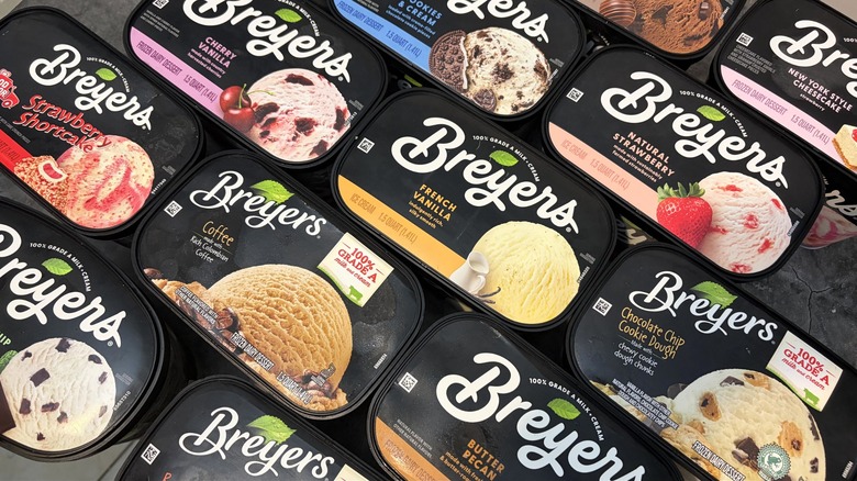 Several cartons of Breyers ice cream including flavors like French vanilla, natural strawberry, and coffee