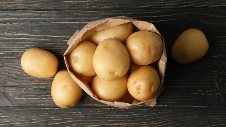 Paper bag filled with potatoes