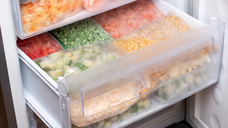 Plastic bags with frozen vegetables