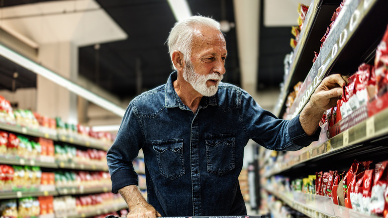 older man shopping for coffee