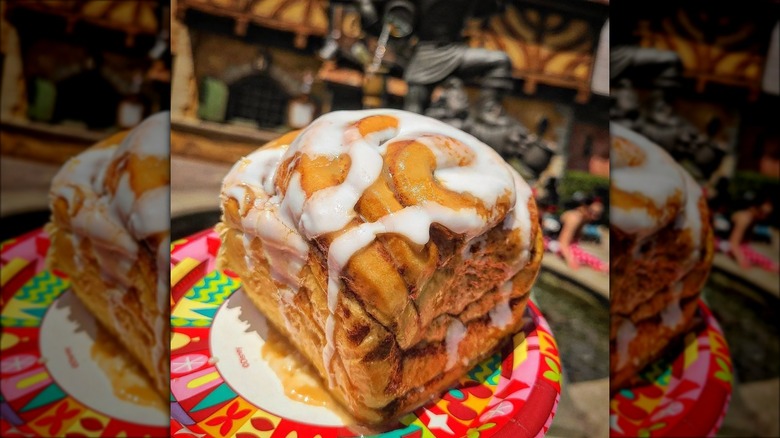 Big cinnamon roll drizzled with icing