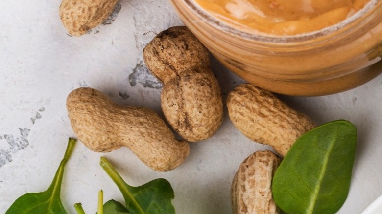 Peanut butter, nuts, and fresh spinach