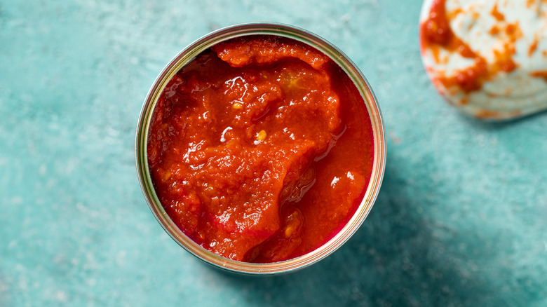 open can of tomatoes