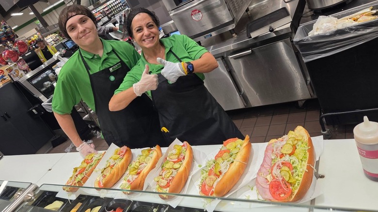 Publix employees preparing subs