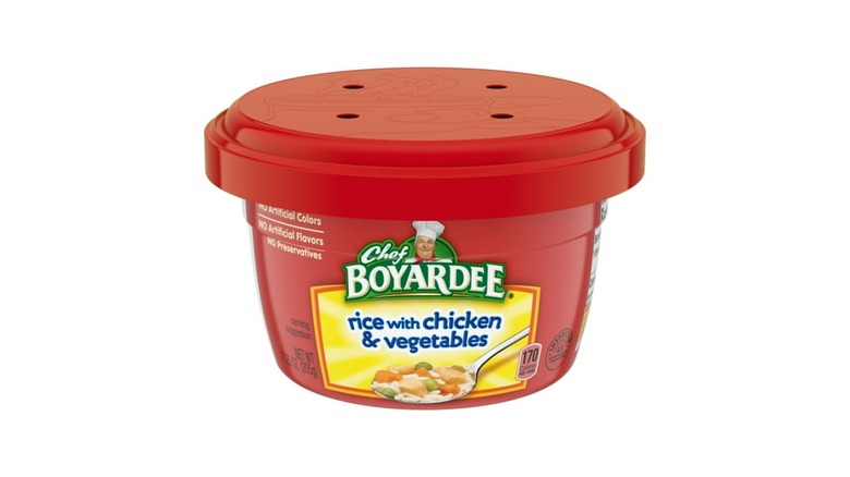 Chef Boyardee red bowl containing rice with chicken and vegetables