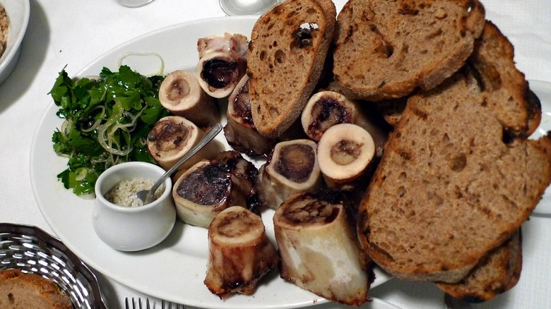 Plate of roast bone marrow and brown toasted bread served at St. John