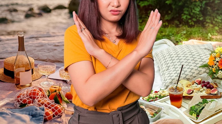 woman at picnic with crossed arms