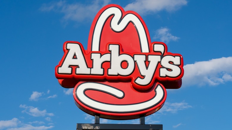Red and white Arby's restaurant sign