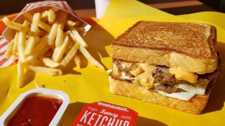 Whataburger patty melt with fries and ketchup