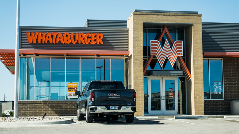 Whataburger exterior with a car parked outside