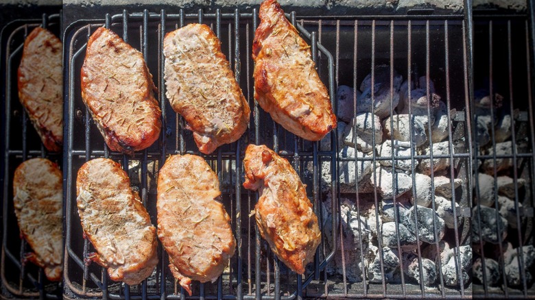 Six pieces of meat over indirect grill heat
