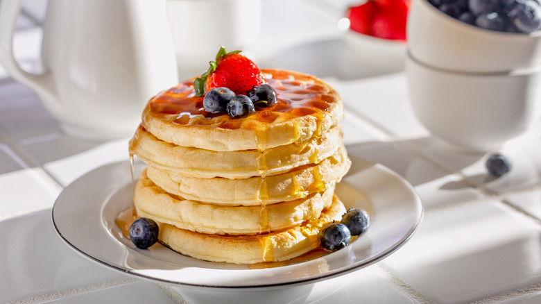 Waffles with fruit and syrup