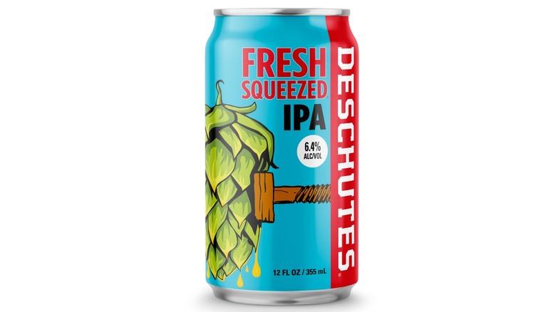 Blue and red can of Deschutes Fresh Squeezed IPA on a white background