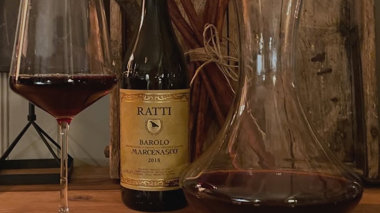 Bottle, wine glass, and decanter of Ratti Marcenasco Barolo
