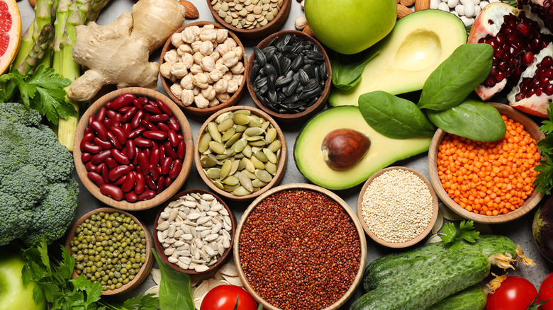 beans, nuts and seeds in individual bowls