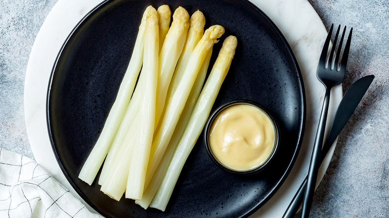 white asparagus with a mayo dip