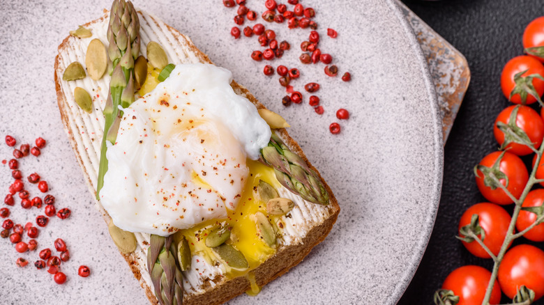 asparagus topped with poached egg