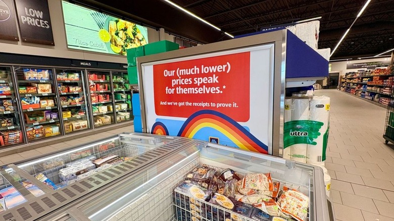 Aldi interior with signage advertising low prices.