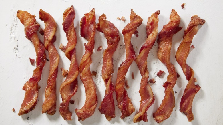 twisted, cooked bacon strips