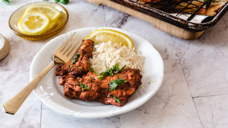 chicken with rice on plate