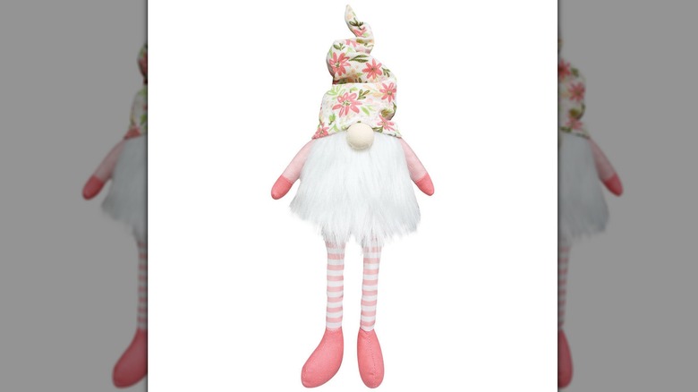 Gnome doll with floral hat and striped stockings