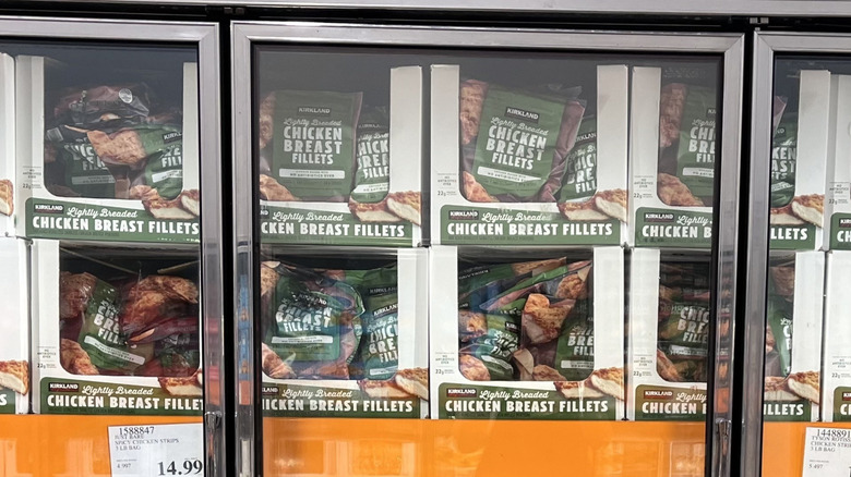Chicken breast filets on display in the freezer case at Costco