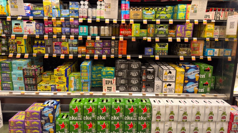 variety of beer on a store shelf