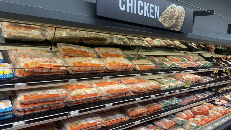 packages of chicken at the grocery store