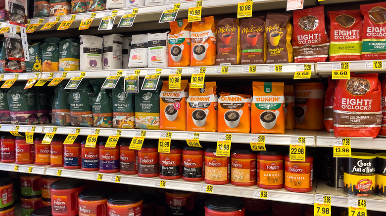 bags of coffee on grocery store shelves