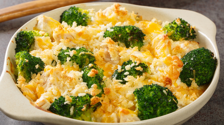 Cooked chicken Divan casserole in a white dish.