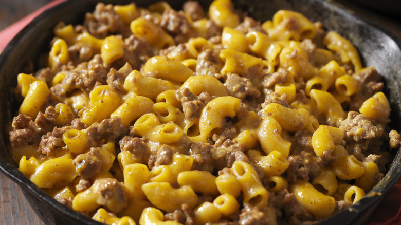 Close-up of Hamburger Helper in a cast iron skillet.