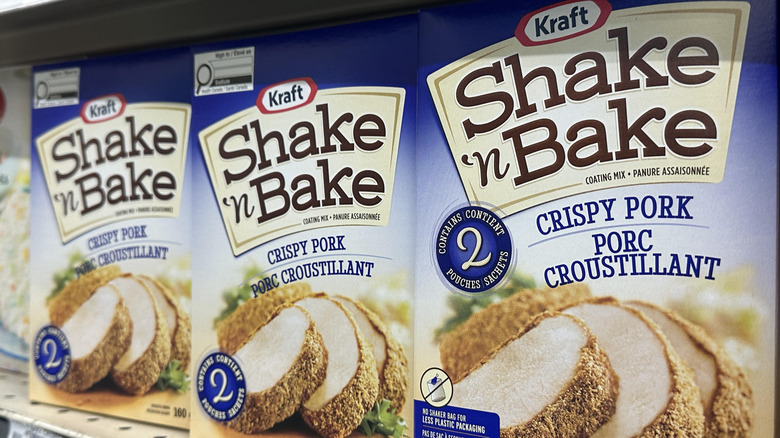 Three Shake 'n Bake Crispy Pork boxes on a shelf.