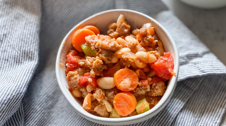 bowl of cassoulet on napkin