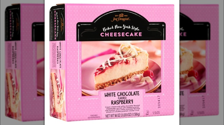 Box containing a white chocolate raspberry-flavored cheesecake.
