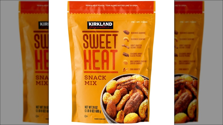 Bag of sweet and spicy snack mix with nuts and other snacks.
