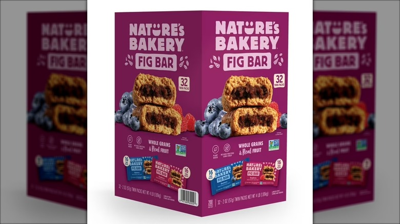 Box of individually wrapped Nature's Bakery fig bars against white background.