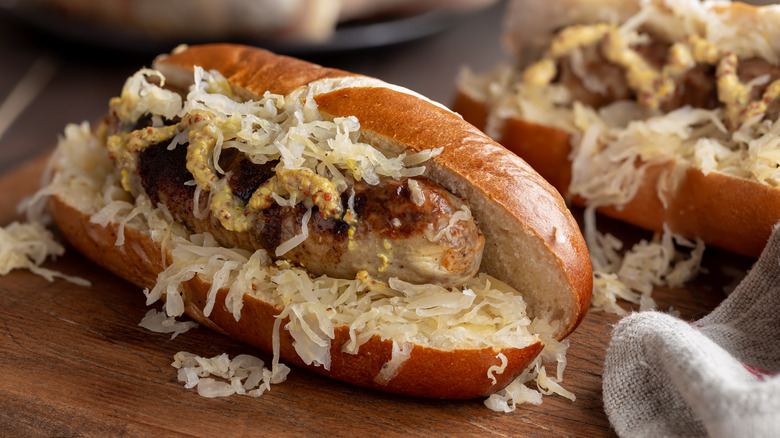 Bratwurst, sauerkraut, mustard on bun