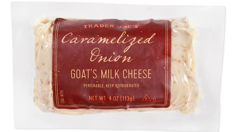 Package of Trader Joe's Caramelized Onion Goat's Milk Cheese against white background.