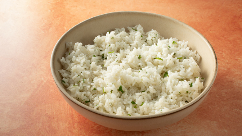 Cilantro lime rice in a beige bowl