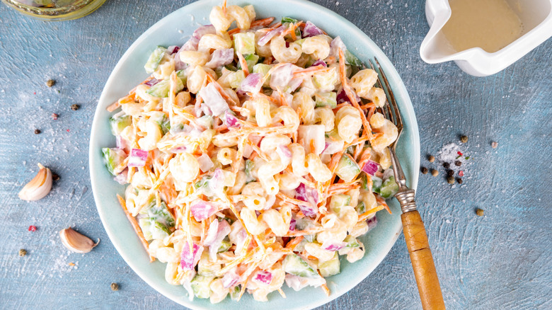 Macaroni salad in a light blue dish