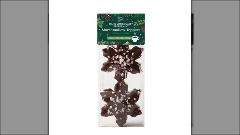 packet of dark chocolate covered marshmallows in the shape of snowflakes