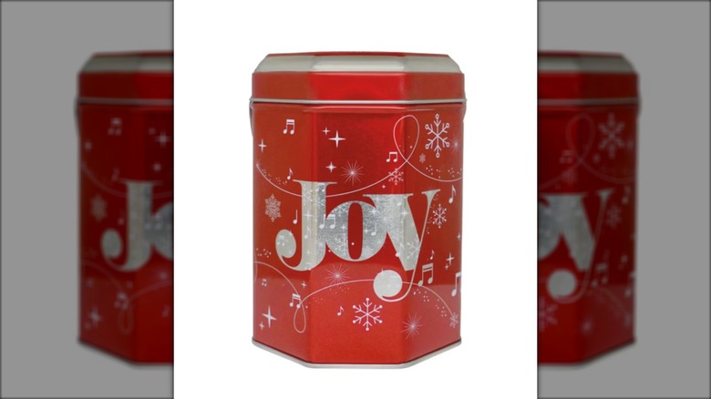 holiday themed tin containing cookies